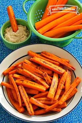  Plate of Baked Carrot Fries and bowl of dipping sauce.