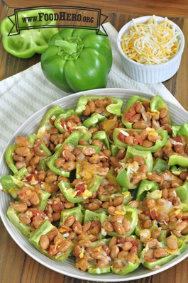 Bell pepper pieces are topped with beans, salsa and cheese for a variation on classic nachos.