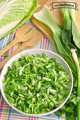 Bowl of seasoned, chopped bok choy.