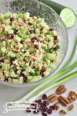 Large bowl of a vegetable packed Couscous Salad.