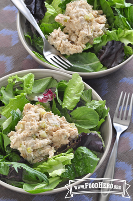 Creamy salmon mix on lettuce in a bowl. 