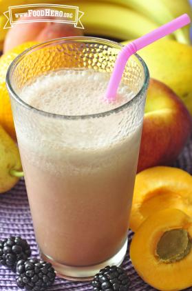 Frothy pink fruit drink with a straw.