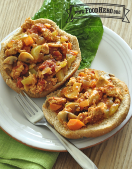 Open faced buns with a saucy meat and vegetable mix. 