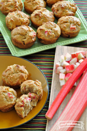 Platter of muffins with small pink rhubarb pieces. 