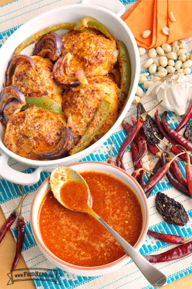 Bowl of thin red salsa shown drizzled over chicken and vegetables. 