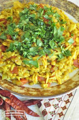 Plate of lentil and orzo mix topped with cilantro.