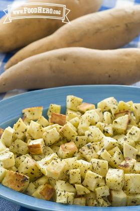 Heavily seasoned cubed sweet potatoes.