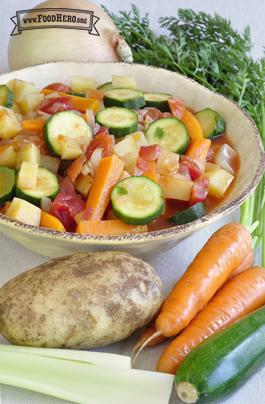 Bowl of soup with a medley of vegetables. 