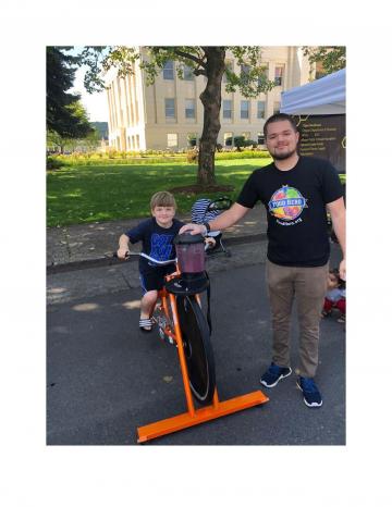 Little Boy Riding Smoothie Bike